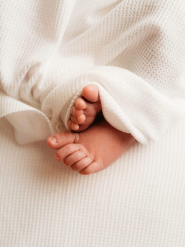 detail of baby toes newborn session